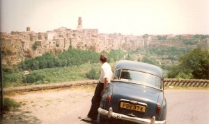 Mark Leaning on a car in an Italian town